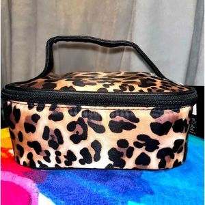 Modella cosmetic train case in cheetah print